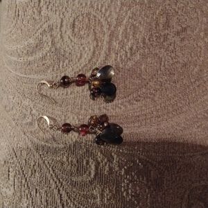 Dangle earrings black ,brown and gray . They will match almost anything.